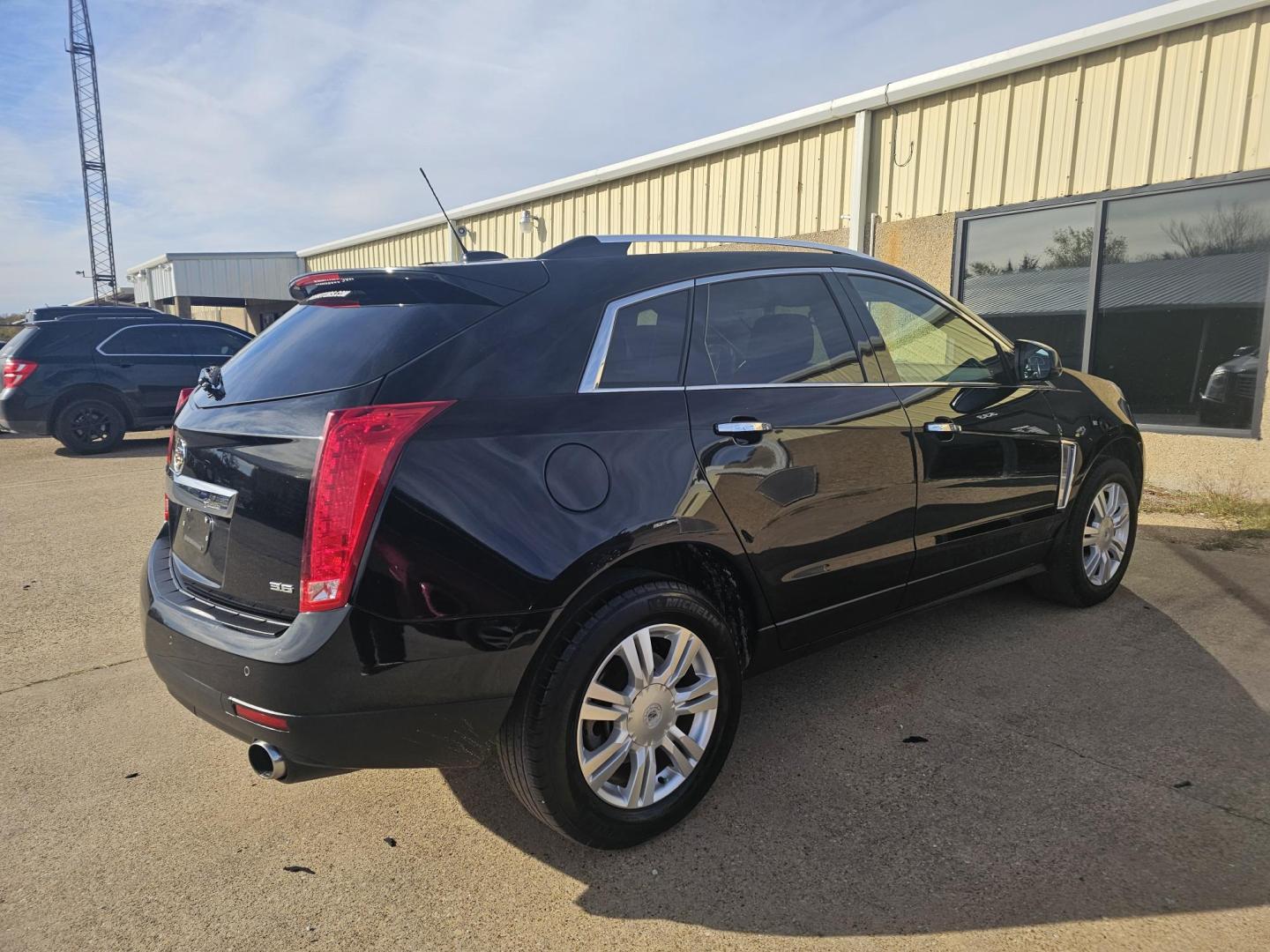 2015 BLACK CADILLAC SRX Luxury Collection AWD (3GYFNEE31FS) with an 3.6L V6 DOHC 24V FFV engine, 6-SPEED AUTOMATIC transmission, located at 533 S Seven Points BLVD, Seven Points, TX, 75143, (430) 255-4030, 32.313999, -96.209351 - Photo#2