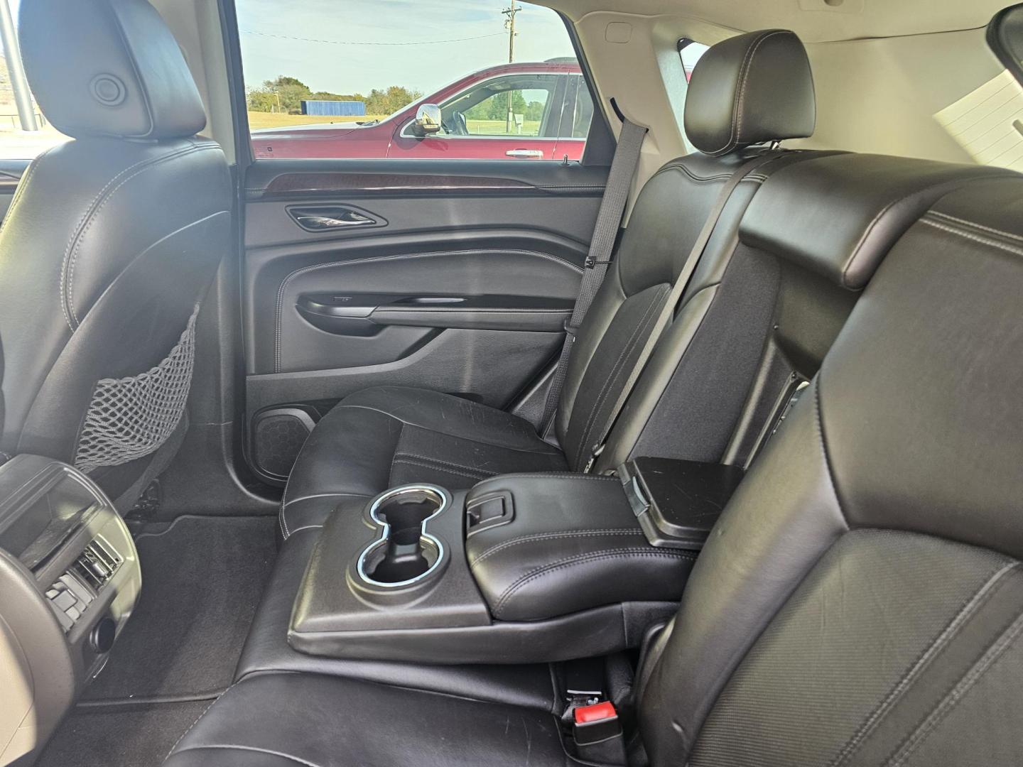 2015 BLACK CADILLAC SRX Luxury Collection AWD (3GYFNEE31FS) with an 3.6L V6 DOHC 24V FFV engine, 6-SPEED AUTOMATIC transmission, located at 533 S Seven Points BLVD, Seven Points, TX, 75143, (430) 255-4030, 32.313999, -96.209351 - Photo#5