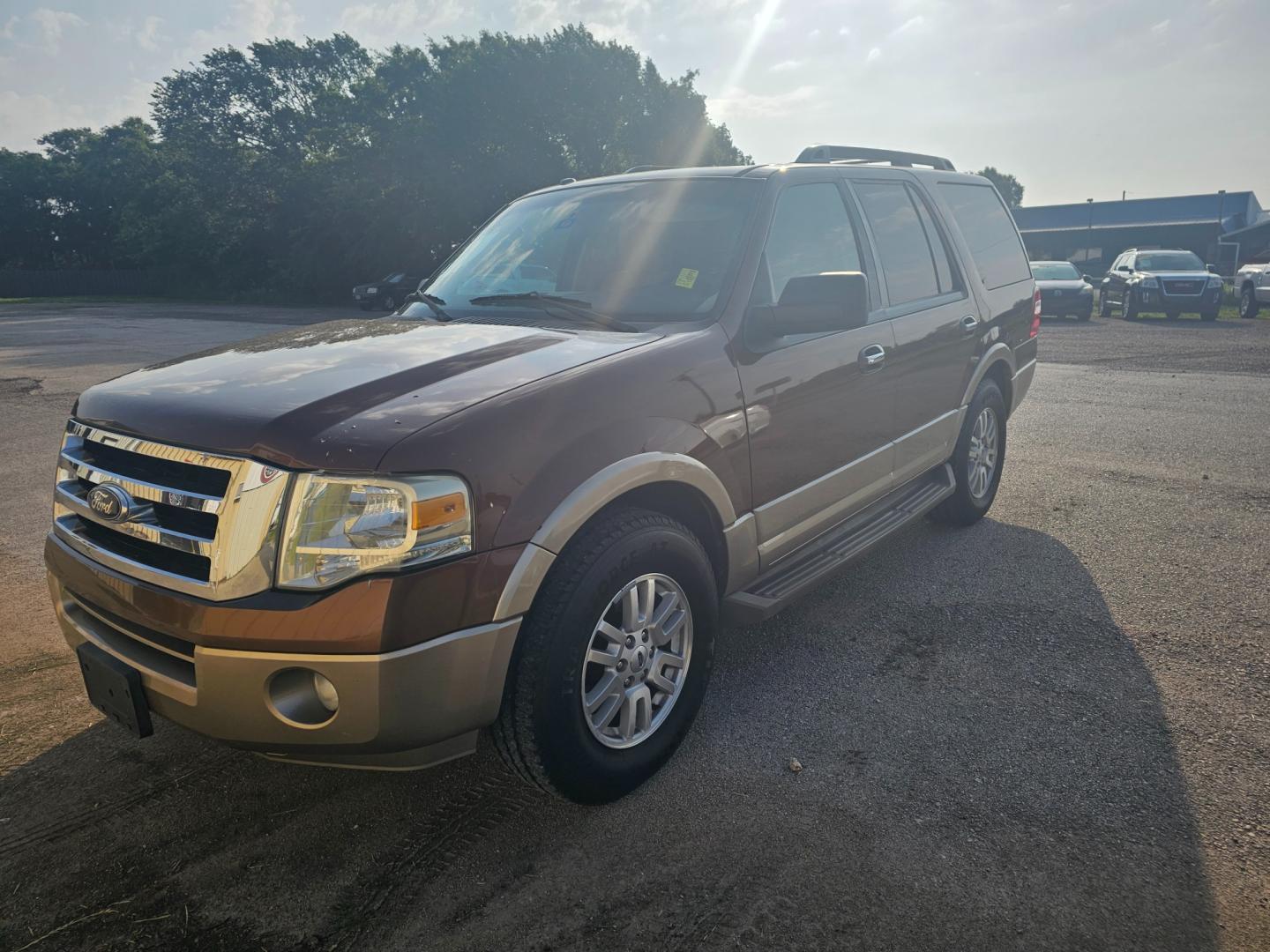 2011 BROWN Ford Expedition King Ranch 2WD (1FMJU1H54BE) with an 5.4L V8 SOHC 16V FFV engine, 6-Speed Automatic transmission, located at 533 S Seven Points BLVD, Seven Points, TX, 75143, (430) 255-4030, 32.313999, -96.209351 - Photo#0