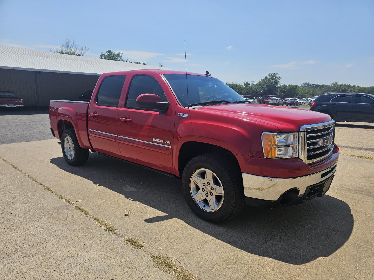 2012 RED GMC Sierra 1500 SLE Crew Cab 4WD (3GTP2VE71CG) with an 5.3L V8 OHV 16V FFV engine, 6-Speed Automatic transmission, located at 533 S Seven Points BLVD, Seven Points, TX, 75143, (430) 255-4030, 32.313999, -96.209351 - Photo#3