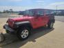 2015 RED Jeep Wrangler Unlimited Sport 4WD (1C4BJWDG3FL) with an 3.6L V6 DOHC 24V FFV engine, located at 533 S Seven Points BLVD, Seven Points, TX, 75143, (430) 255-4030, 32.313999, -96.209351 - Photo#0