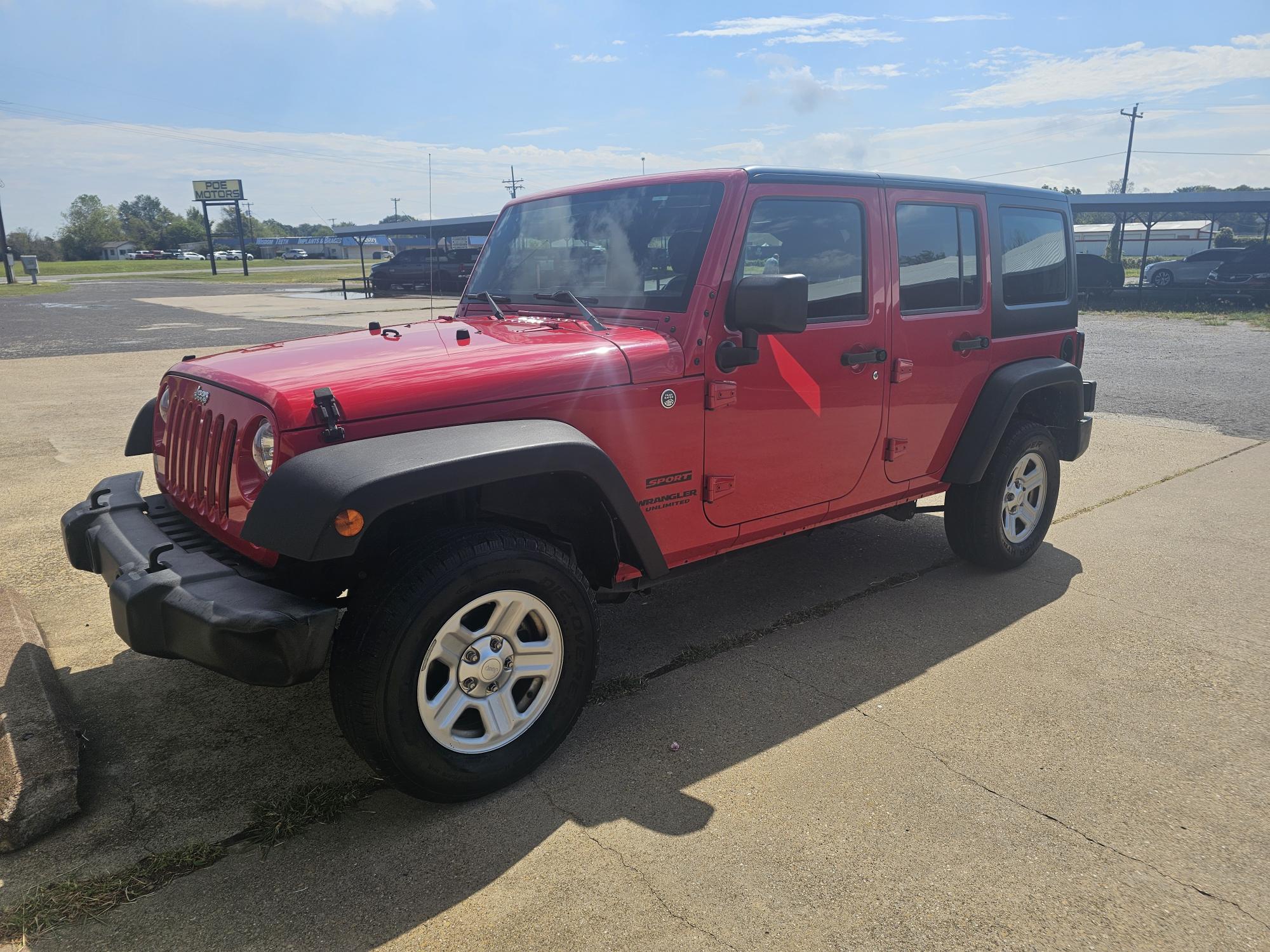 photo of 2015 Jeep Wrangler Unlimited Sport 4WD