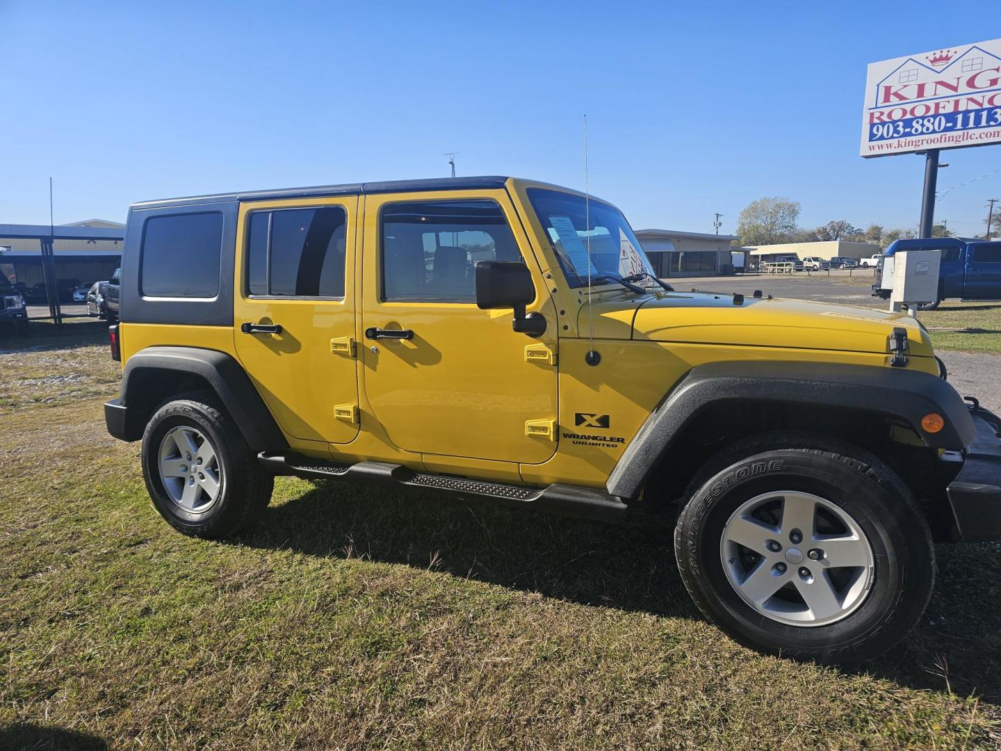2009 YELLOW Jeep Wrangler Unlimited X 4WD (1J4GA39159L) with an 3.8L V6 OHV 12V engine, located at 607 S Seven Points BLVD, Seven Points, TX, 75143, (430) 255-4030, 32.313934, -96.207932 - Photo#1