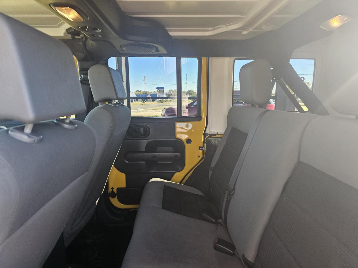 2009 YELLOW Jeep Wrangler Unlimited X 4WD (1J4GA39159L) with an 3.8L V6 OHV 12V engine, located at 607 S Seven Points BLVD, Seven Points, TX, 75143, (430) 255-4030, 32.313934, -96.207932 - Photo#5