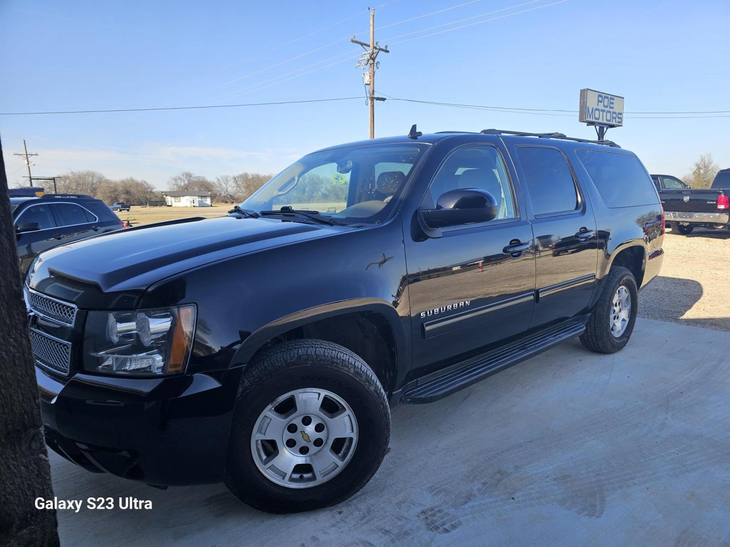 2012 BLACK Chevrolet Suburban LT 1500 4WD (1GNSKJE74CR) with an 5.3L V8 OHV 16V FFV engine, 6-Speed Automatic transmission, located at 607 S Seven Points BLVD, Seven Points, TX, 75143, (430) 255-4030, 32.313934, -96.207932 - Photo#0