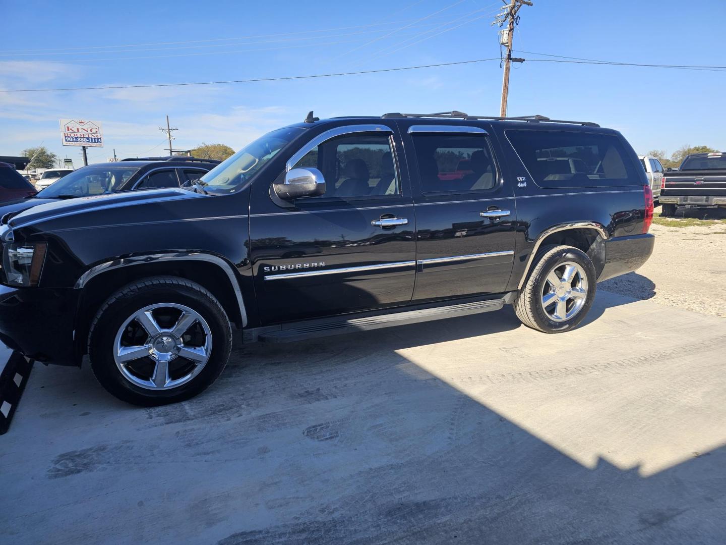 2014 BLACK Chevrolet Suburban LTZ 1500 4WD (1GNSKKE77ER) with an 5.3L V8 OHV 16V FFV engine, 6-Speed Automatic transmission, located at 607 S Seven Points BLVD, Seven Points, TX, 75143, (430) 255-4030, 32.313934, -96.207932 - Photo#0