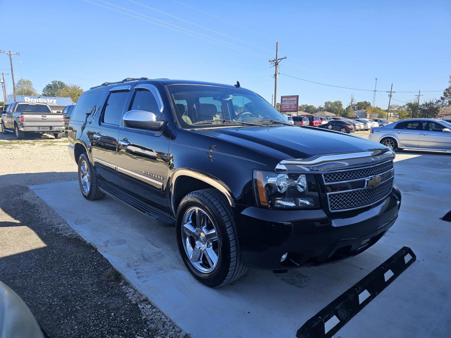 2014 BLACK Chevrolet Suburban LTZ 1500 4WD (1GNSKKE77ER) with an 5.3L V8 OHV 16V FFV engine, 6-Speed Automatic transmission, located at 607 S Seven Points BLVD, Seven Points, TX, 75143, (430) 255-4030, 32.313934, -96.207932 - Photo#1