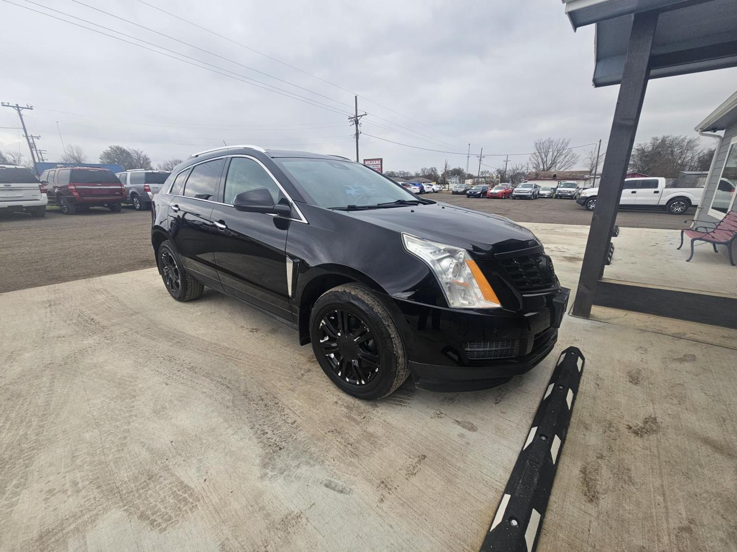 2014 BLACK Cadillac SRX Luxury Collection FWD (3GYFNBE37ES) with an 3.6L V6 DOHC 24V FFV engine, 6-Speed Automatic transmission, located at 607 S Seven Points BLVD, Seven Points, TX, 75143, (430) 255-4030, 32.313934, -96.207932 - Photo#1