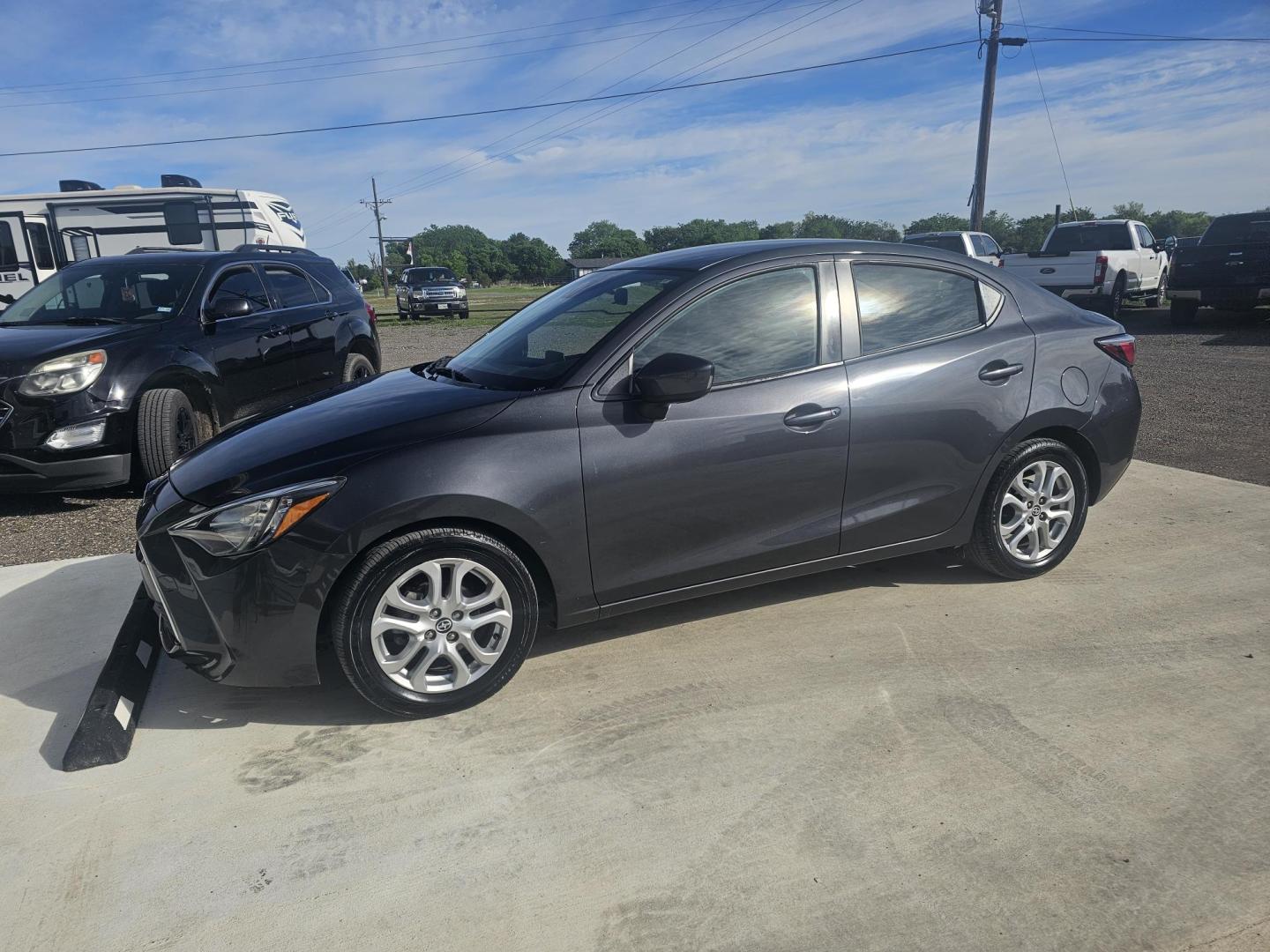 2016 GRAY Scion iA 6A (3MYDLBZV5GY) with an 1.5L L4 DOHC 16V engine, 6A transmission, located at 607 S Seven Points BLVD, Seven Points, TX, 75143, (430) 255-4030, 32.313934, -96.207932 - Photo#0