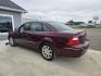 2005 MAROON Ford Five Hundred Limited (1FAFP25105G) with an 3.0L V6 DOHC 24V engine, 6-Speed Automatic Overdrive transmission, located at 607 S Seven Points BLVD, Seven Points, TX, 75143, (430) 255-4030, 32.313934, -96.207932 - Photo#3