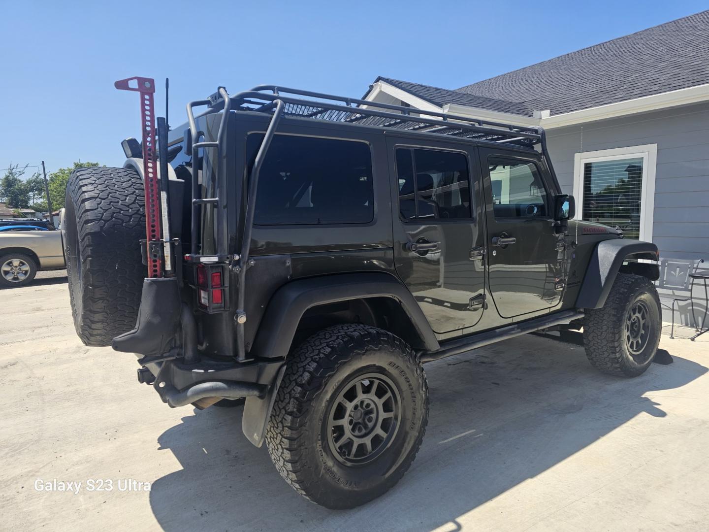 2015 GREEN Jeep Wrangler Unlimited Rubicon 4WD (1C4BJWFG4FL) with an 3.6L V6 DOHC 24V FFV engine, located at 607 S Seven Points BLVD, Seven Points, TX, 75143, (430) 255-4030, 32.313934, -96.207932- Photo#2