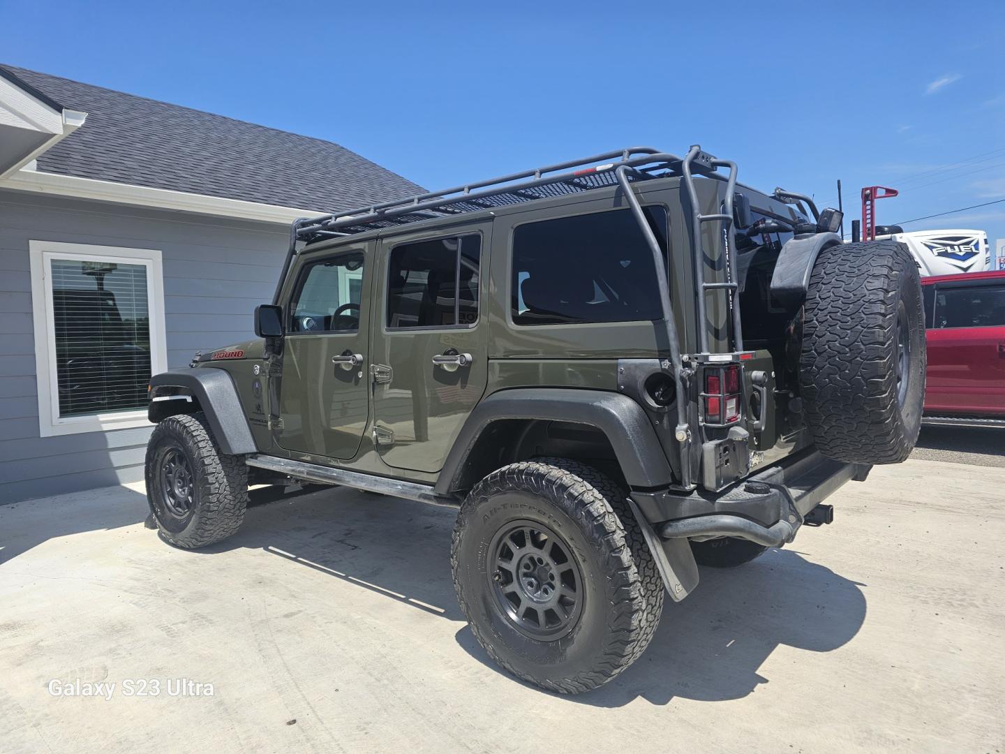 2015 GREEN Jeep Wrangler Unlimited Rubicon 4WD (1C4BJWFG4FL) with an 3.6L V6 DOHC 24V FFV engine, located at 607 S Seven Points BLVD, Seven Points, TX, 75143, (430) 255-4030, 32.313934, -96.207932- Photo#3