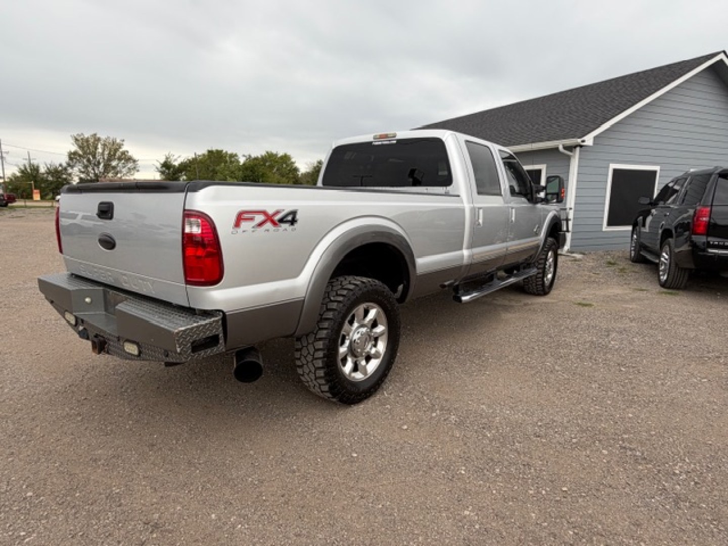2012 SILVER Ford F-350 SD King Ranch Crew Cab 4WD (1FT8W3BT7CE) with an 6.7L V8 OHV 16V DIESEL engine, 6-Speed Automatic transmission, located at 607 S Seven Points BLVD, Seven Points, TX, 75143, (430) 255-4030, 32.313934, -96.207932- Photo#2