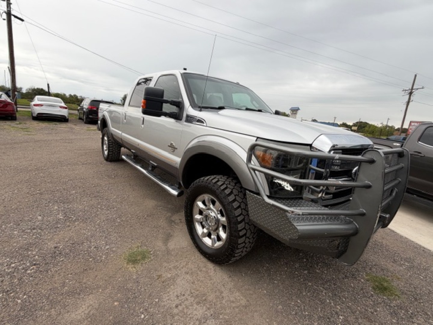 2012 SILVER Ford F-350 SD King Ranch Crew Cab 4WD (1FT8W3BT7CE) with an 6.7L V8 OHV 16V DIESEL engine, 6-Speed Automatic transmission, located at 607 S Seven Points BLVD, Seven Points, TX, 75143, (430) 255-4030, 32.313934, -96.207932- Photo#3