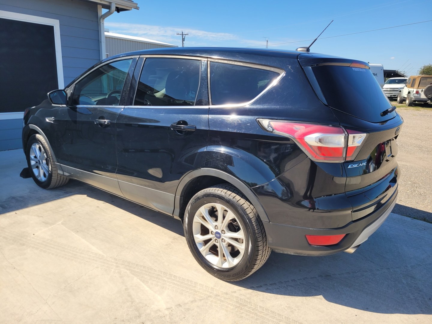 2017 BLACK Ford Escape SE FWD (1FMCU0GD5HU) with an 1.5L L4 DOHC 16V engine, 6A transmission, located at 607 S Seven Points BLVD, Seven Points, TX, 75143, (430) 255-4030, 32.313934, -96.207932- Photo#1