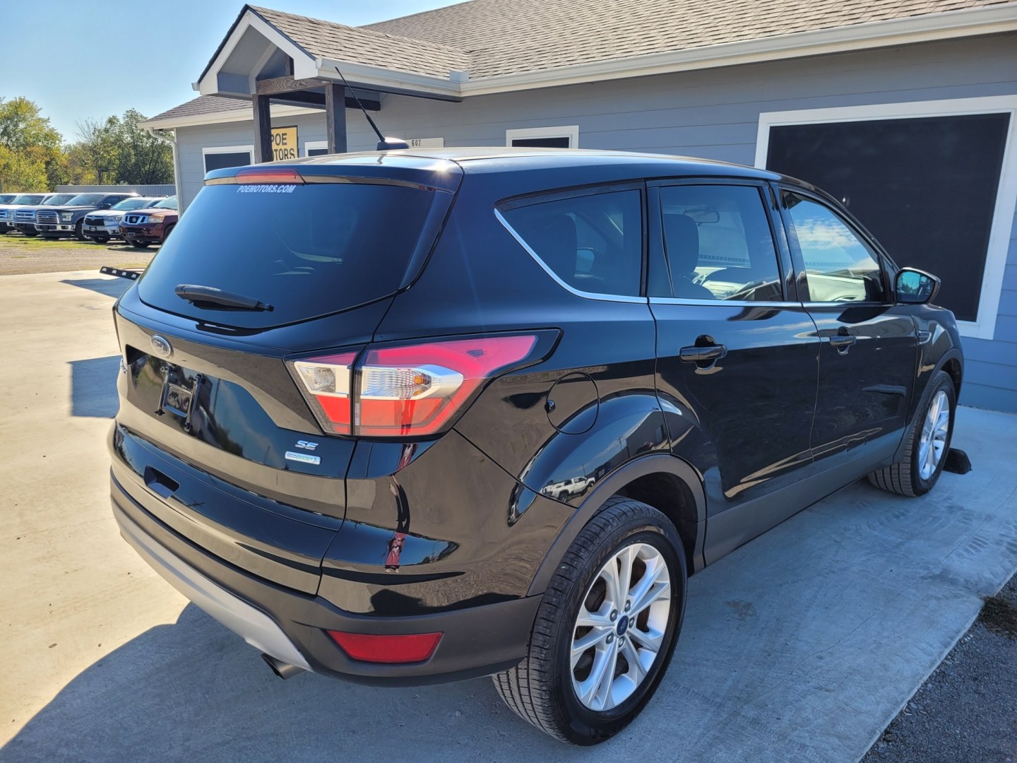 2017 BLACK Ford Escape SE FWD (1FMCU0GD5HU) with an 1.5L L4 DOHC 16V engine, 6A transmission, located at 607 S Seven Points BLVD, Seven Points, TX, 75143, (430) 255-4030, 32.313934, -96.207932- Photo#2